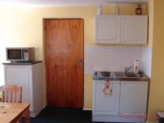 Apartmány Forest kuchyň