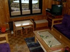Apartmá U nás v Kocourkově obýv. pokoj