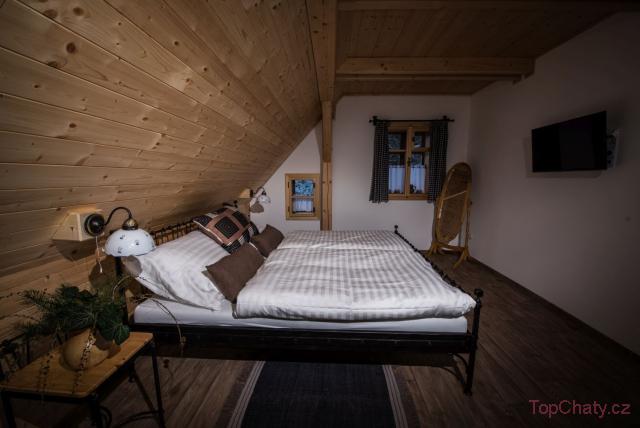 Roubenka u sjezdovky 